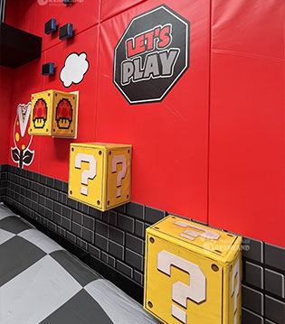 Super Mario-themed interactive play wall